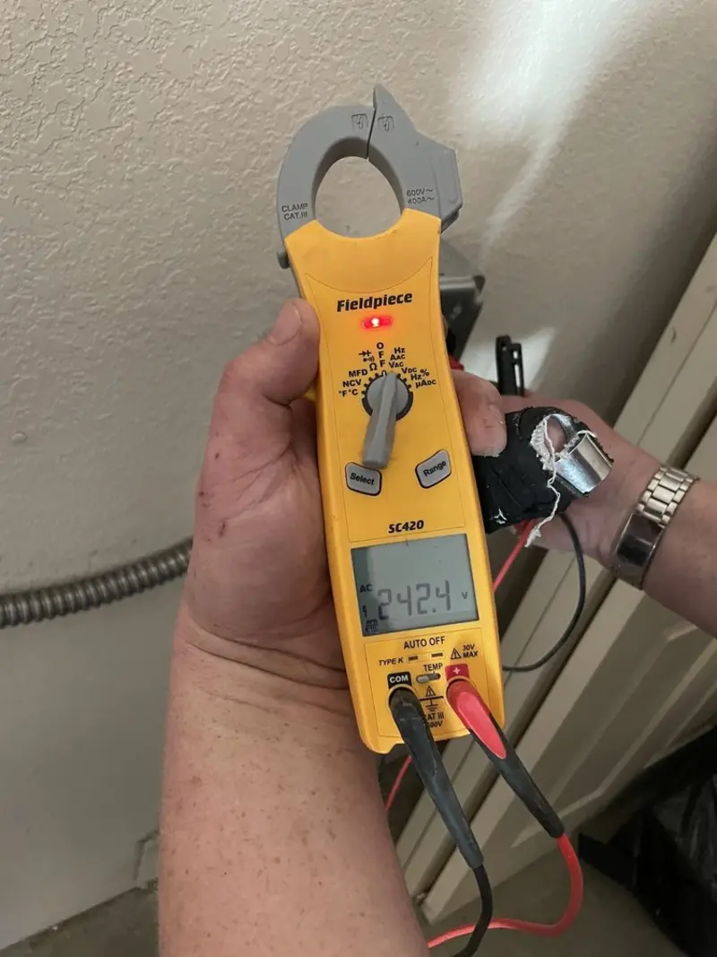 Voltage testing with clamp meter during Whole House Surge Protector in Mannford